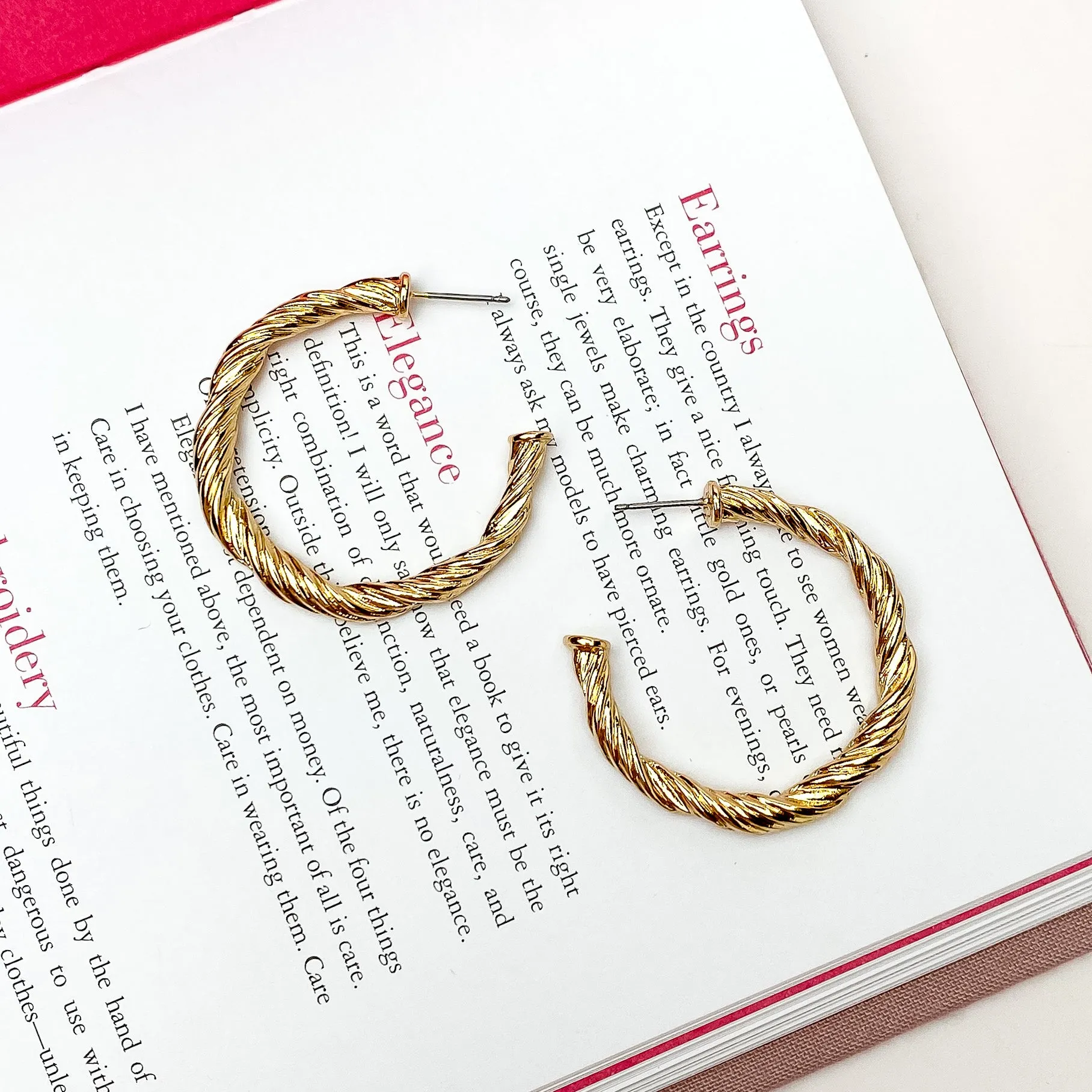 Anything Goes Twisted Medium Hoop Earrings in Gold Tone