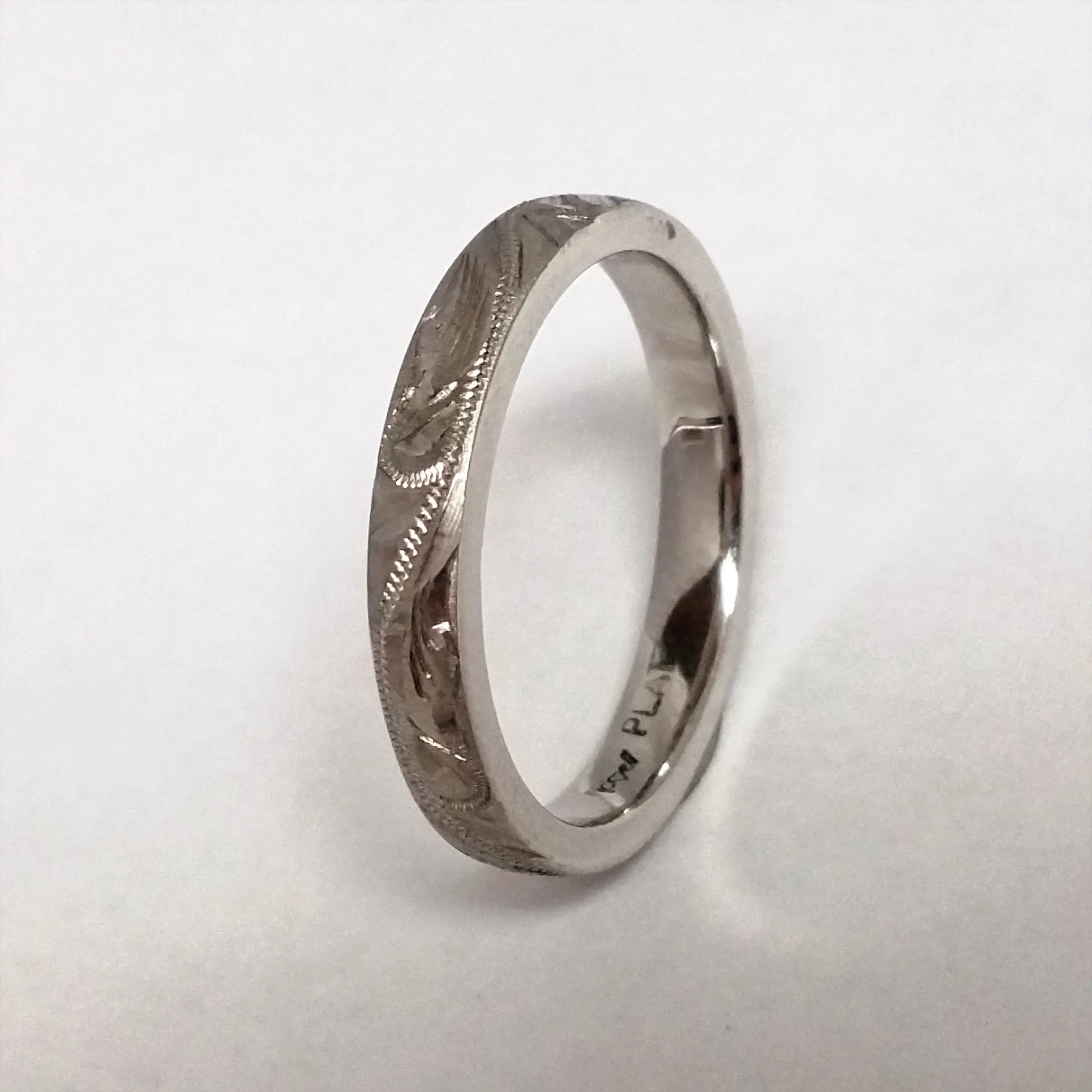 Novell Platinum Engraved Band